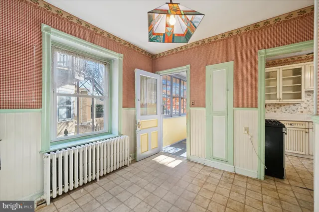a view of a hallway with windows
