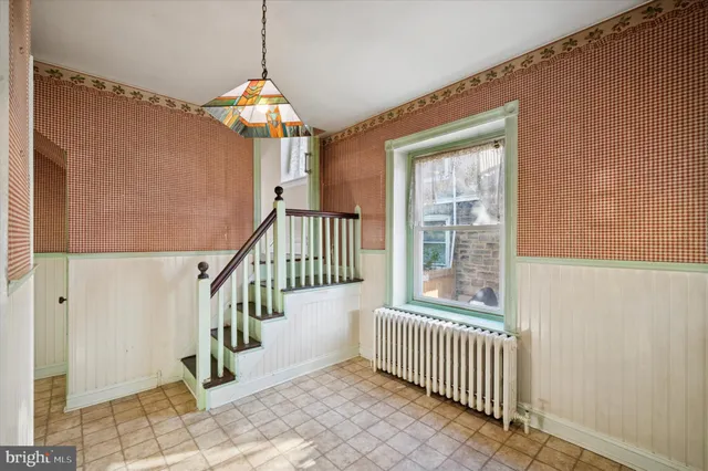 a view of a hallway with windows