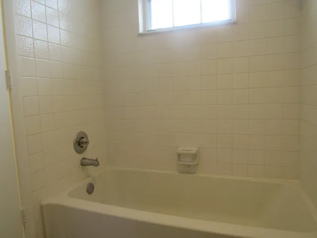 a bathroom with a bathtub