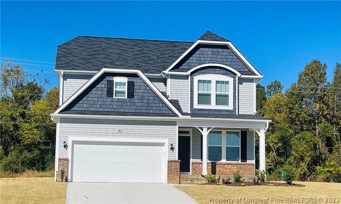 102 Wild Stream Erwin, NC 28339 - Photo 1 of 2 a front view of a house