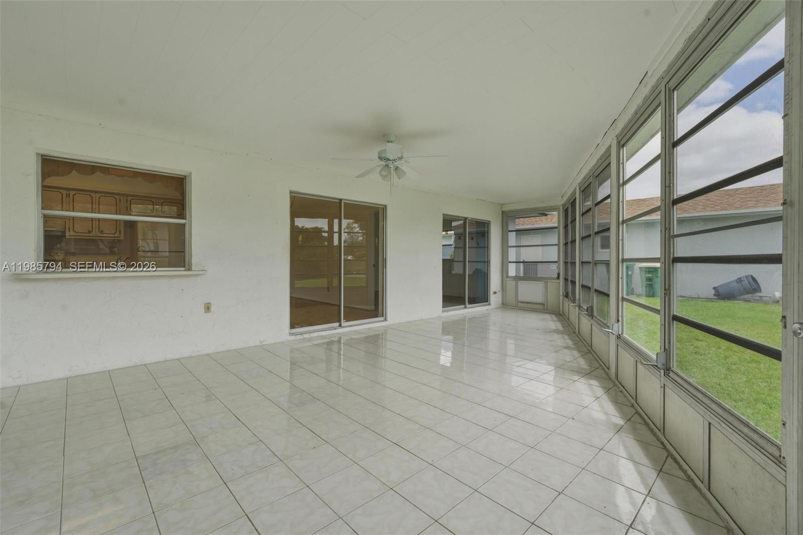 9306 Northwest 80th Street Tamarac, FL 33321 - Photo 21 of 45 a view of an empty room with a window
