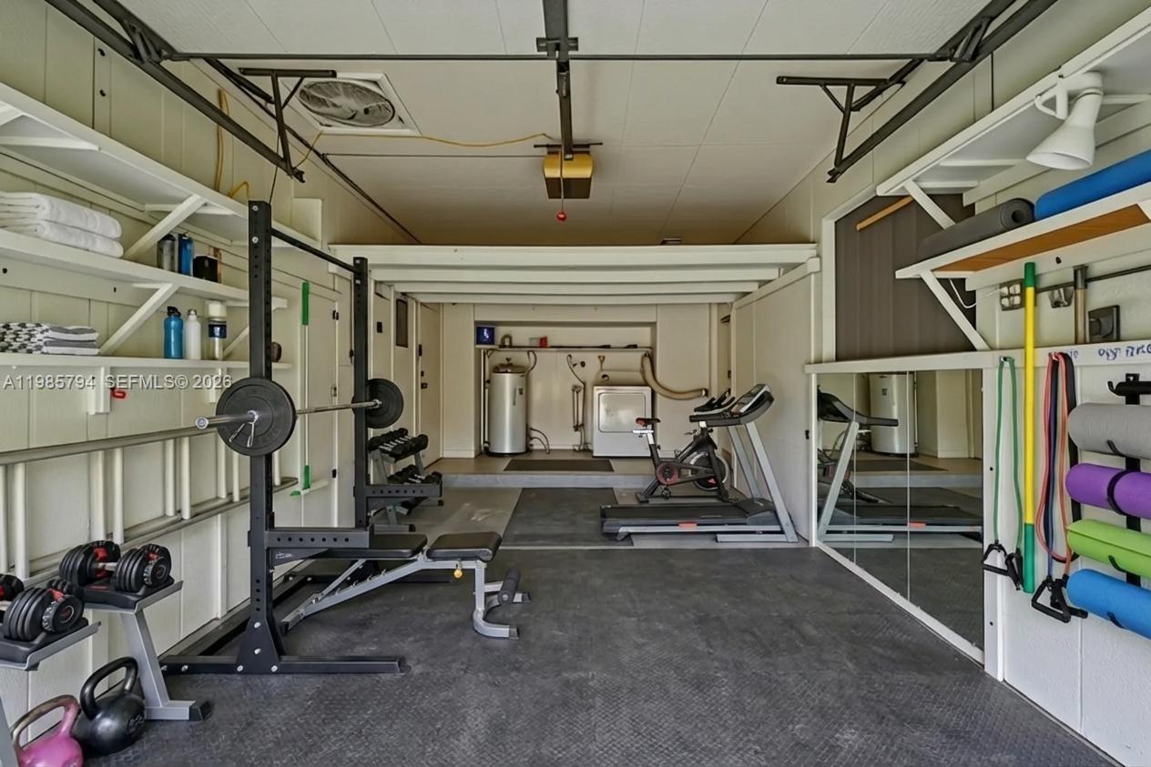 9306 Northwest 80th Street Tamarac, FL 33321 - Photo 31 of 45 a view of a room with gym equipment