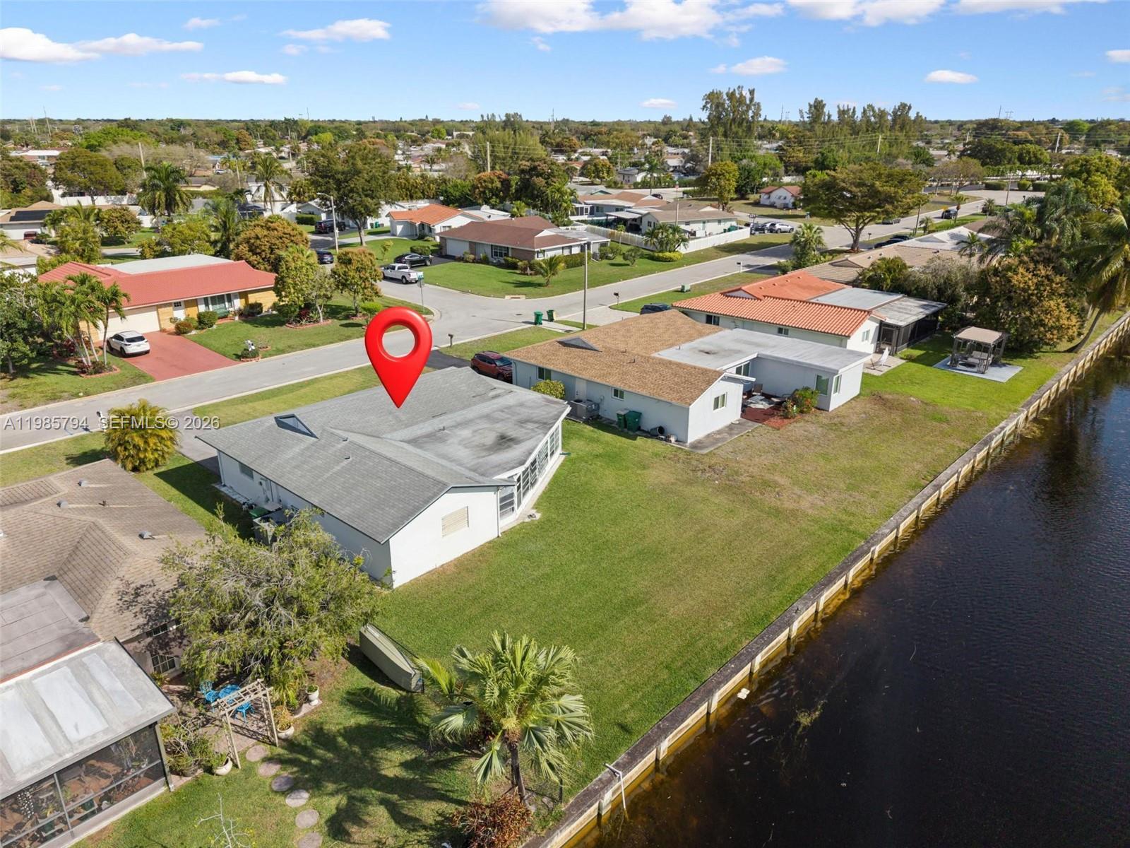 9306 Northwest 80th Street Tamarac, FL 33321 - Photo 37 of 45 an aerial view of residential houses with outdoor space