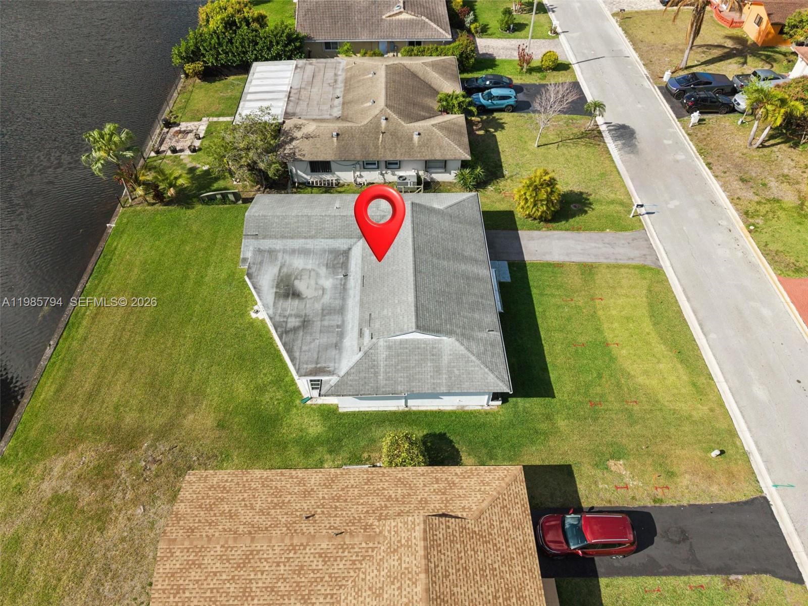 9306 Northwest 80th Street Tamarac, FL 33321 - Photo 38 of 45 a view of swimming pool with a bench in the background