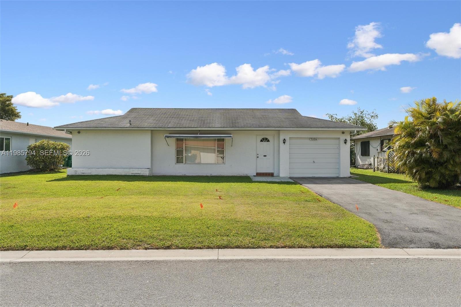 9306 Northwest 80th Street Tamarac, FL 33321 - Photo 40 of 45 a view of a big room with a yard