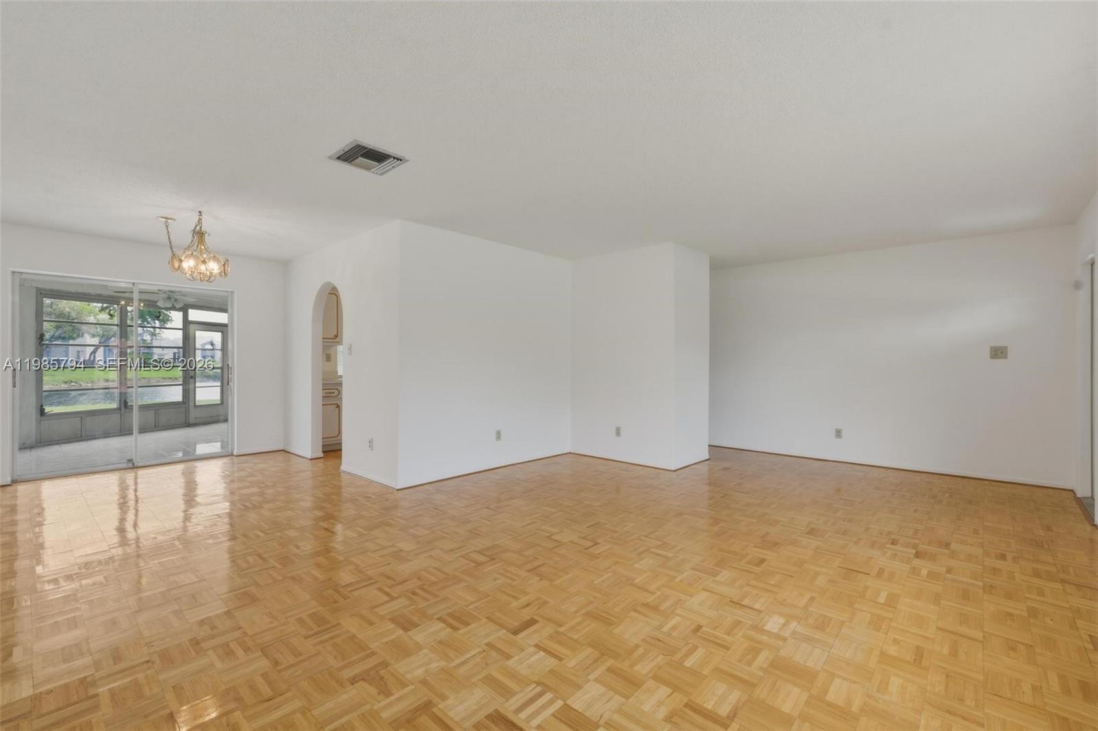 9306 Northwest 80th Street Tamarac, FL 33321 - Photo 7 of 45 a view of empty room with window