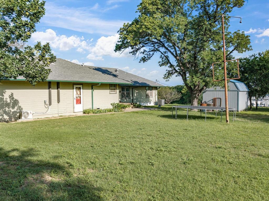 301 Ovilla Road Waxahachie, TX 75167 - Photo 6 of 38 a view of a house with a big yard