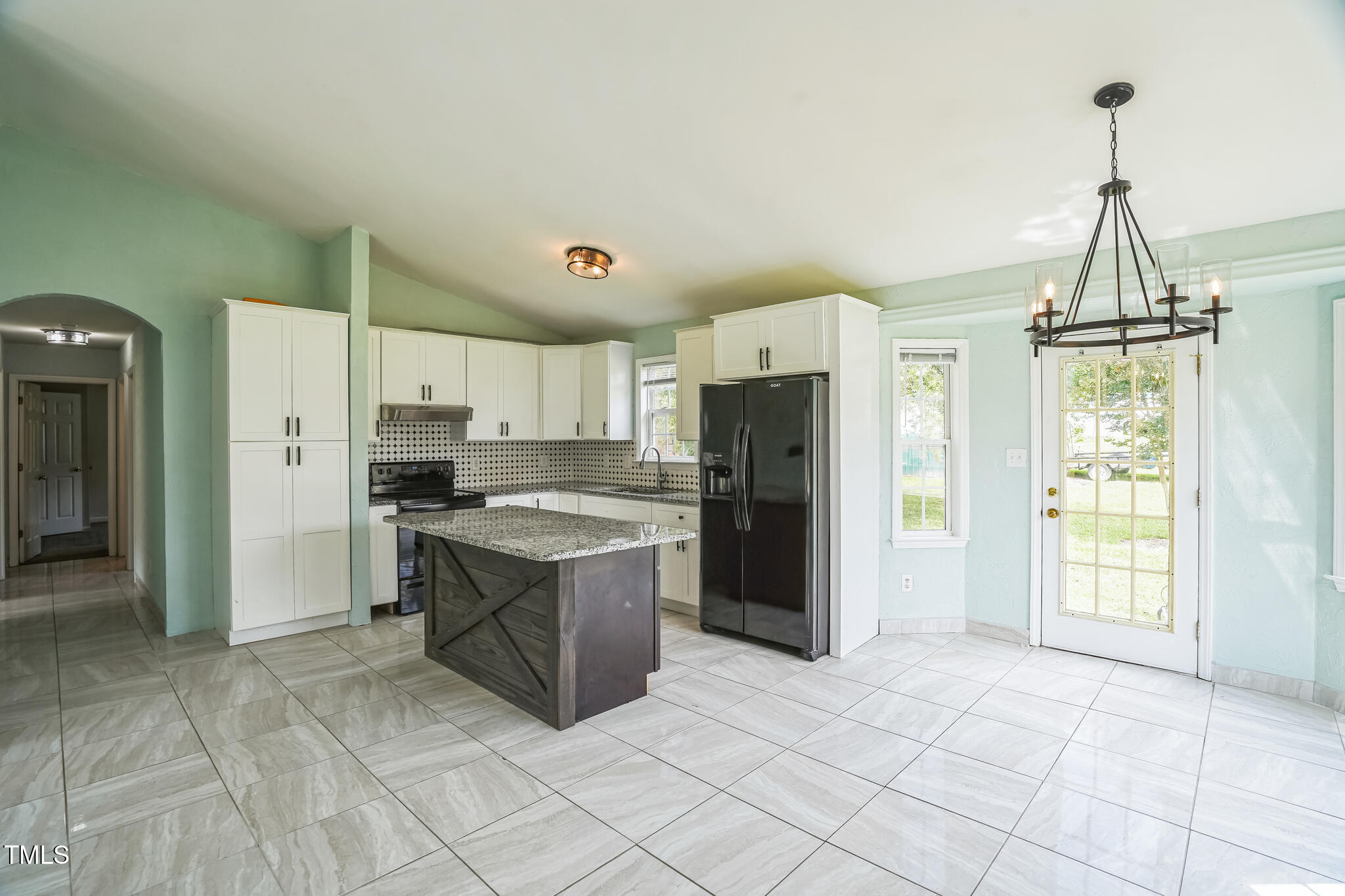 1270 Old School Road Four Oaks, NC 27524 - Photo 11 of 30 a kitchen with stainless steel appliances granite countertop a refrigerator and a sink