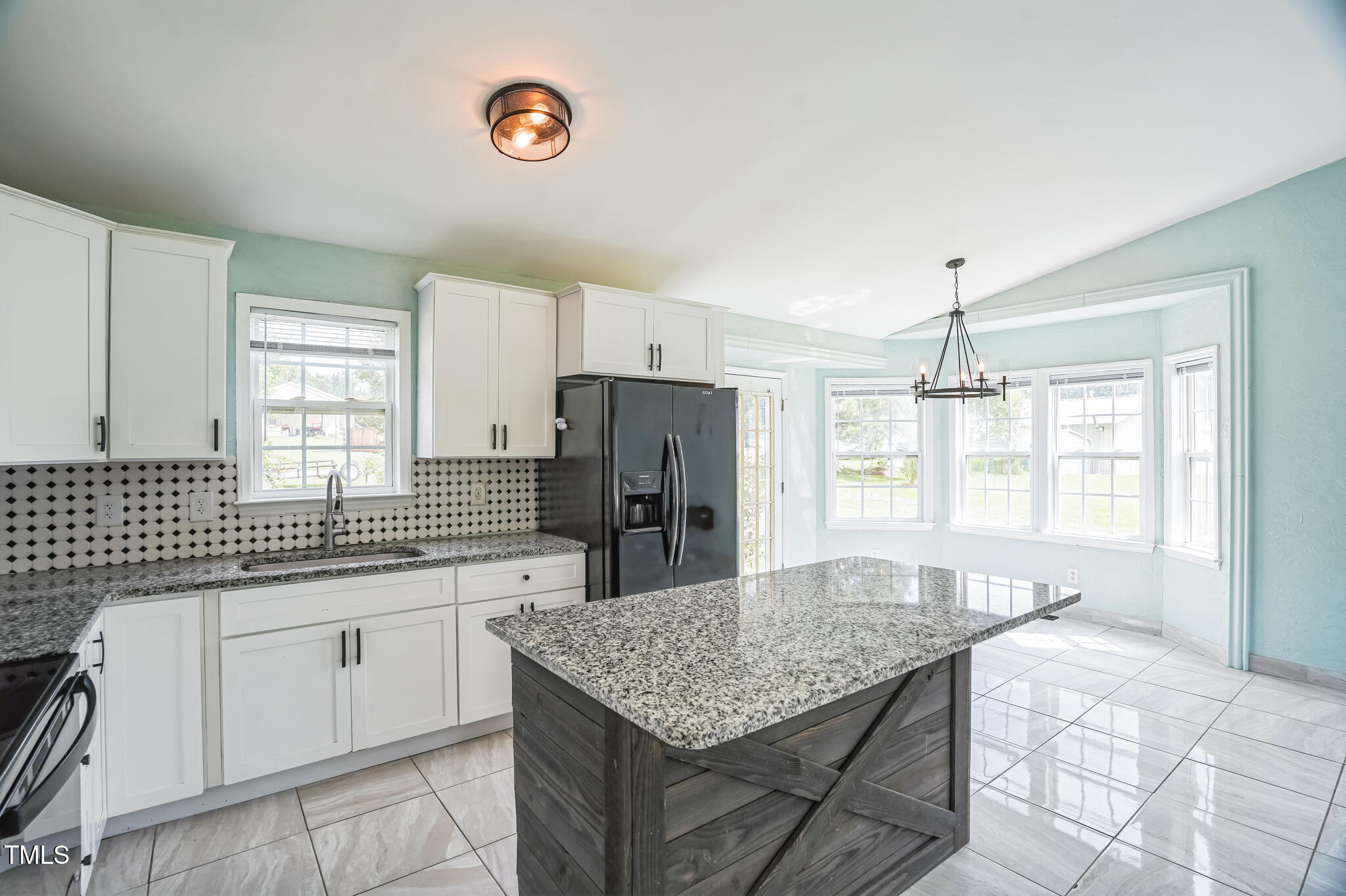 1270 Old School Road Four Oaks, NC 27524 - Photo 14 of 30 a kitchen with a sink refrigerator and window
