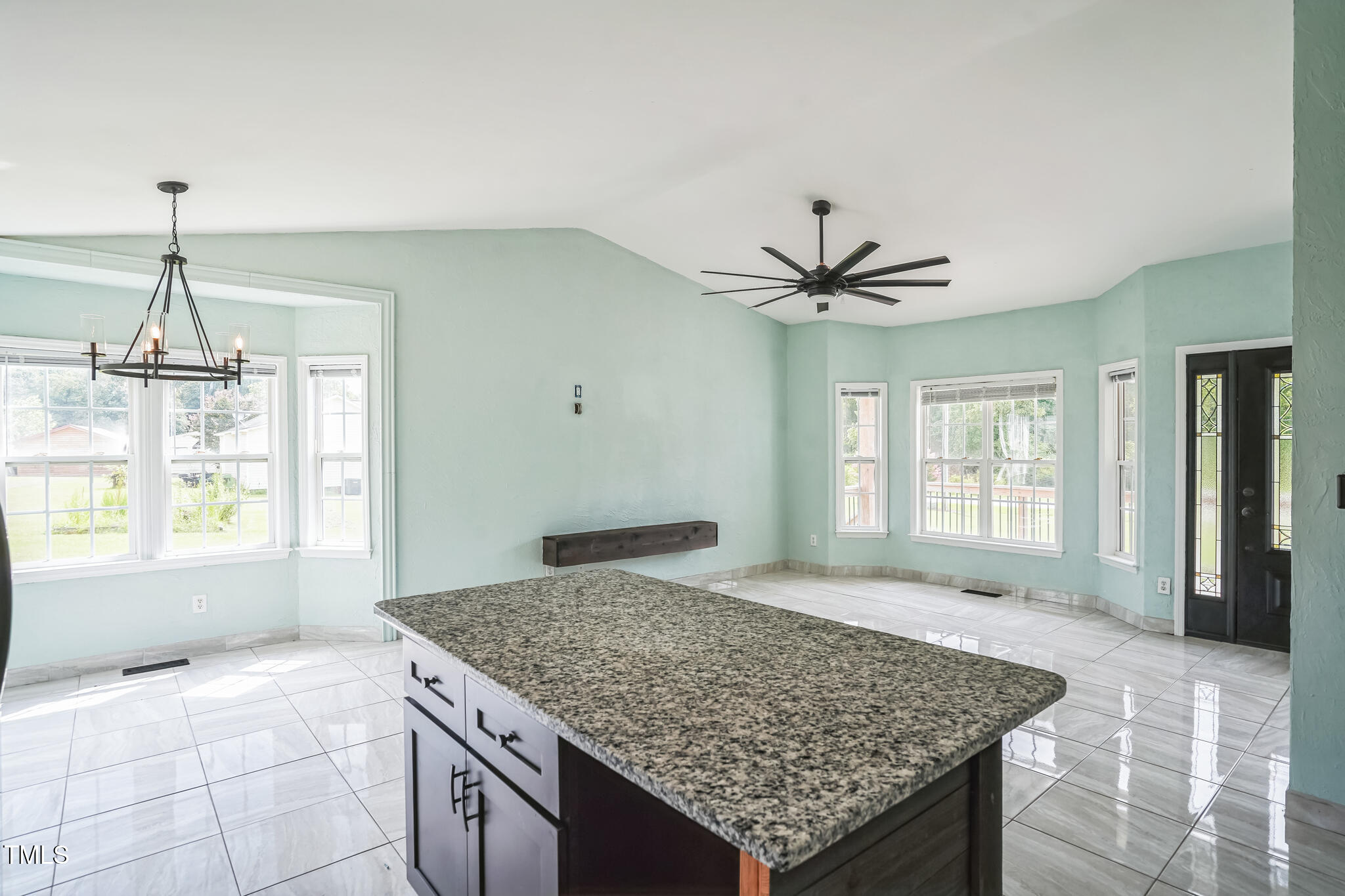 1270 Old School Road Four Oaks, NC 27524 - Photo 15 of 30 a kitchen with stainless steel appliances granite countertop a sink dishwasher with a dining table and chairs
