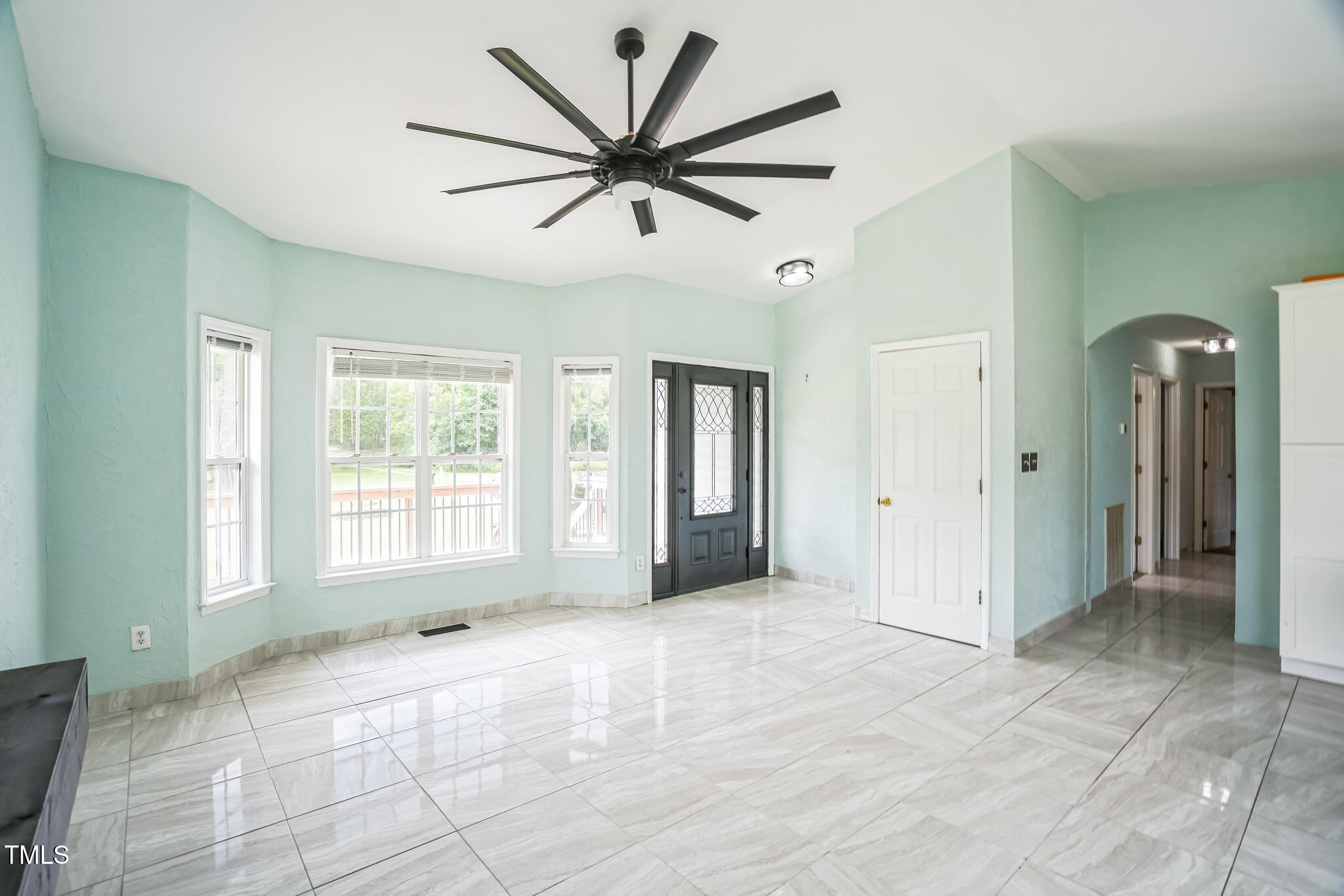 1270 Old School Road Four Oaks, NC 27524 - Photo 21 of 30 a view of a livingroom with a ceiling fan and window