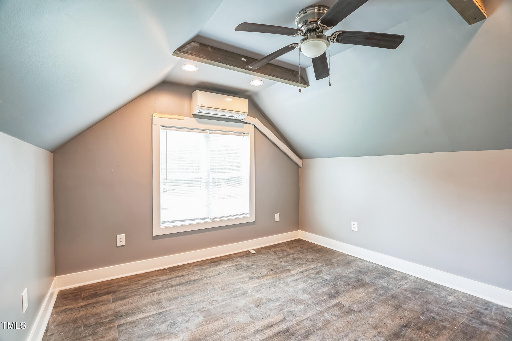1270 Old School Road Four Oaks, NC 27524 - Photo 28 of 30 an empty room with a window and a fan