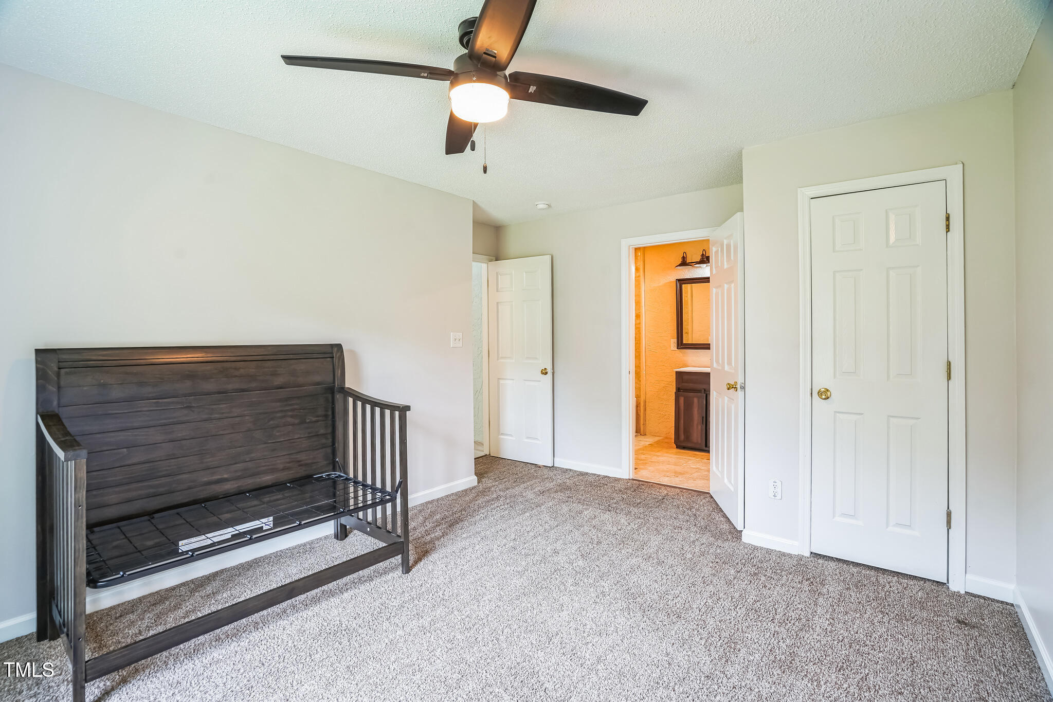 1270 Old School Road Four Oaks, NC 27524 - Photo 8 of 30 a view of an empty room with a ceiling fan
