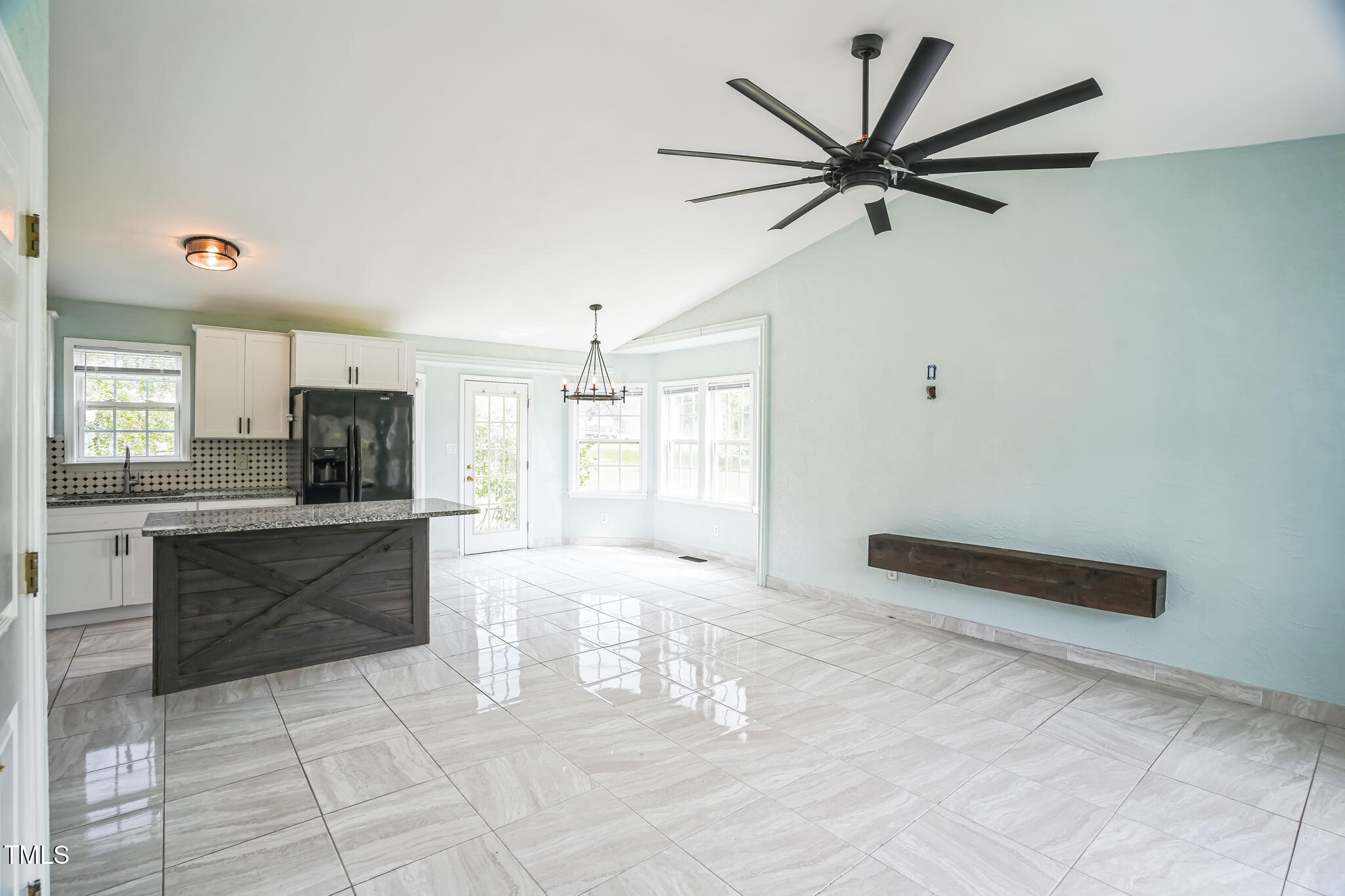 1270 Old School Road Four Oaks, NC 27524 - Photo 9 of 30 a large white kitchen with a sink and stainless steel appliances