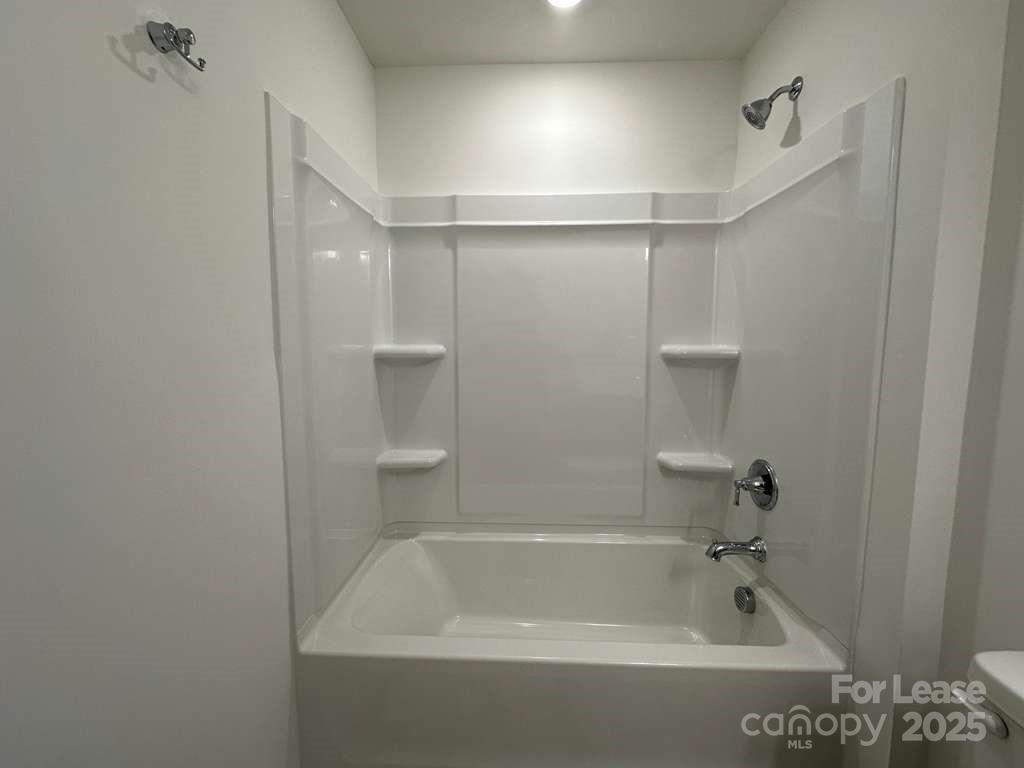 3514 Nimbell Road Monroe, NC 28110 - Photo 12 of 19 a bathroom with a shower and tub
