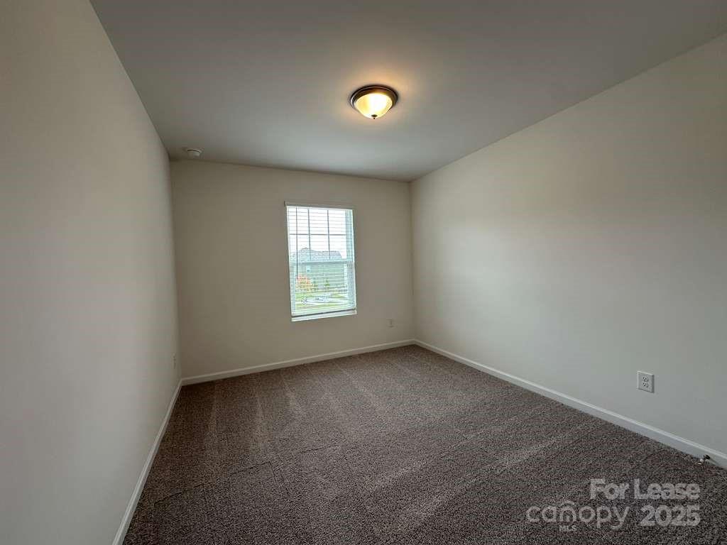3514 Nimbell Road Monroe, NC 28110 - Photo 15 of 19 an empty room with a window