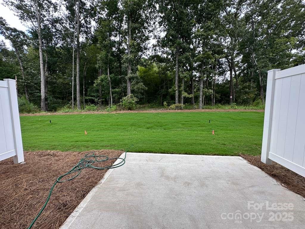 3514 Nimbell Road Monroe, NC 28110 - Photo 19 of 19 a view of a backyard with a garden