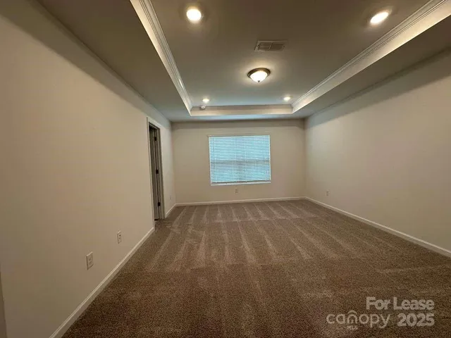 an empty room with a empty space and window