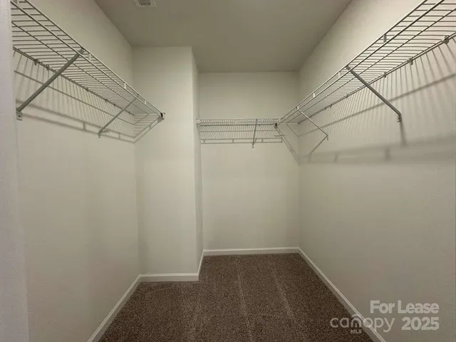 a view of a room with racks on the wall