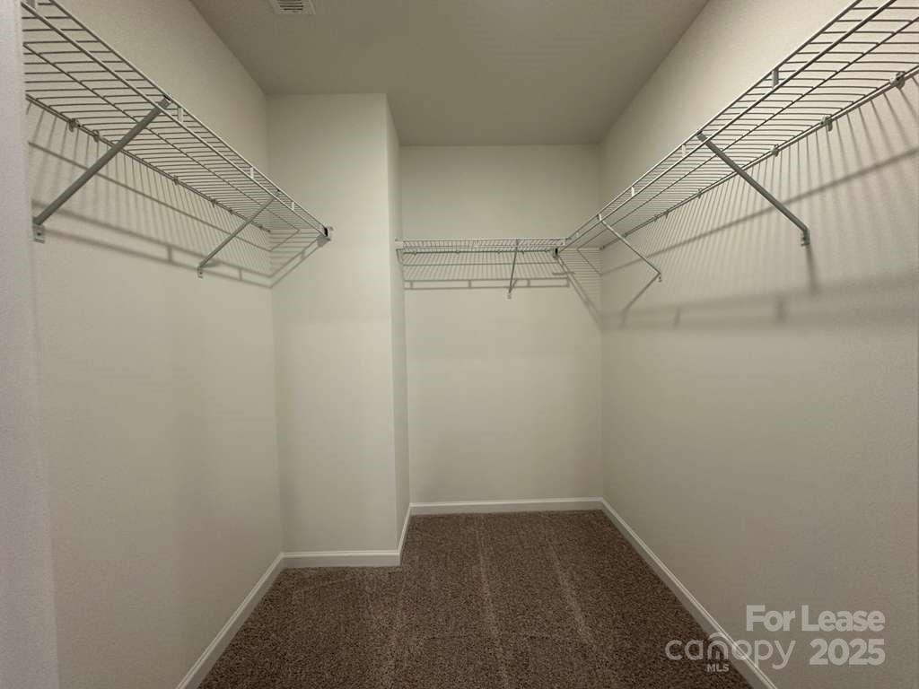 3514 Nimbell Road Monroe, NC 28110 - Photo 9 of 19 a view of a room with racks on the wall