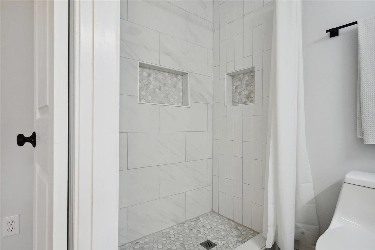 7250 Cedar Road Bartlett, TN 38135 - Photo 19 of 34 a bathroom with a shower