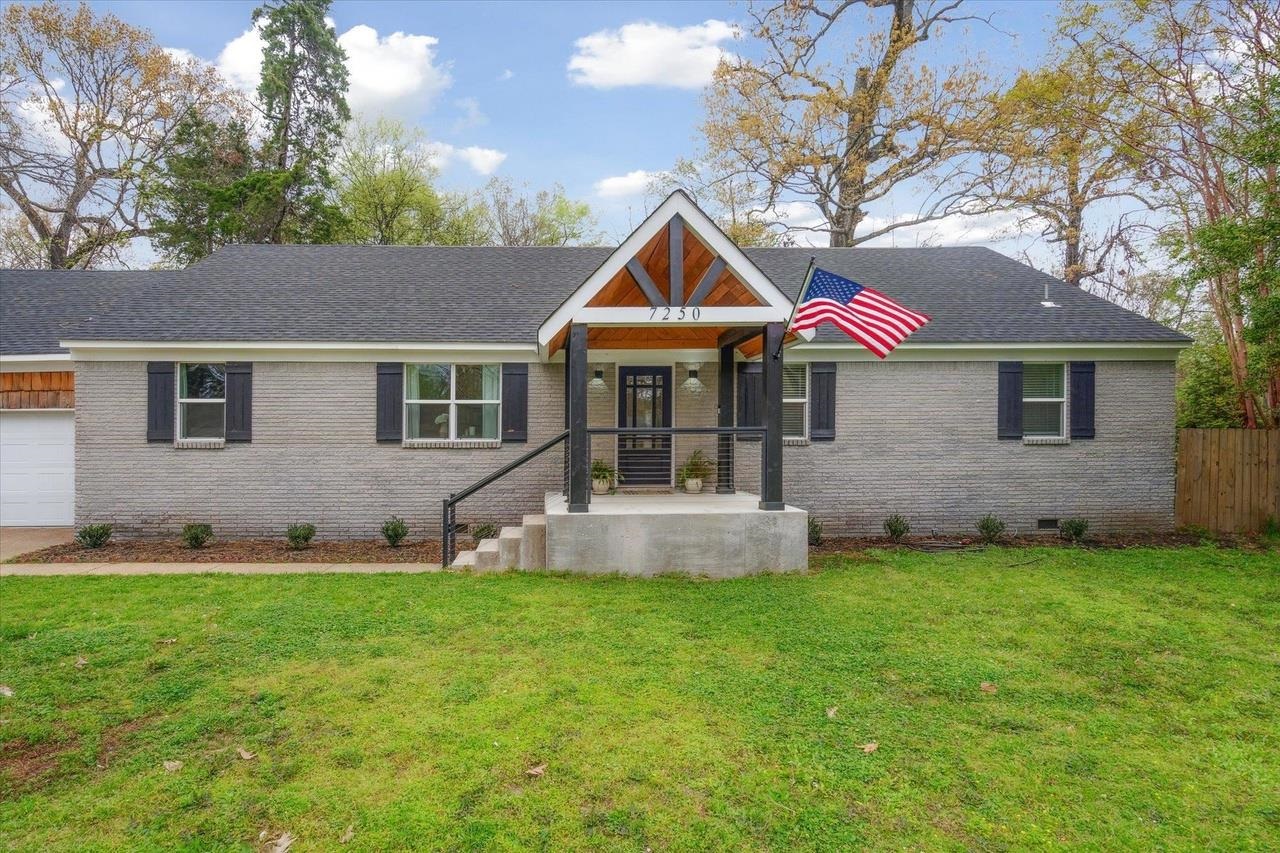 7250 Cedar Road Bartlett, TN 38135 - Photo 2 of 34 a front view of a house with garden