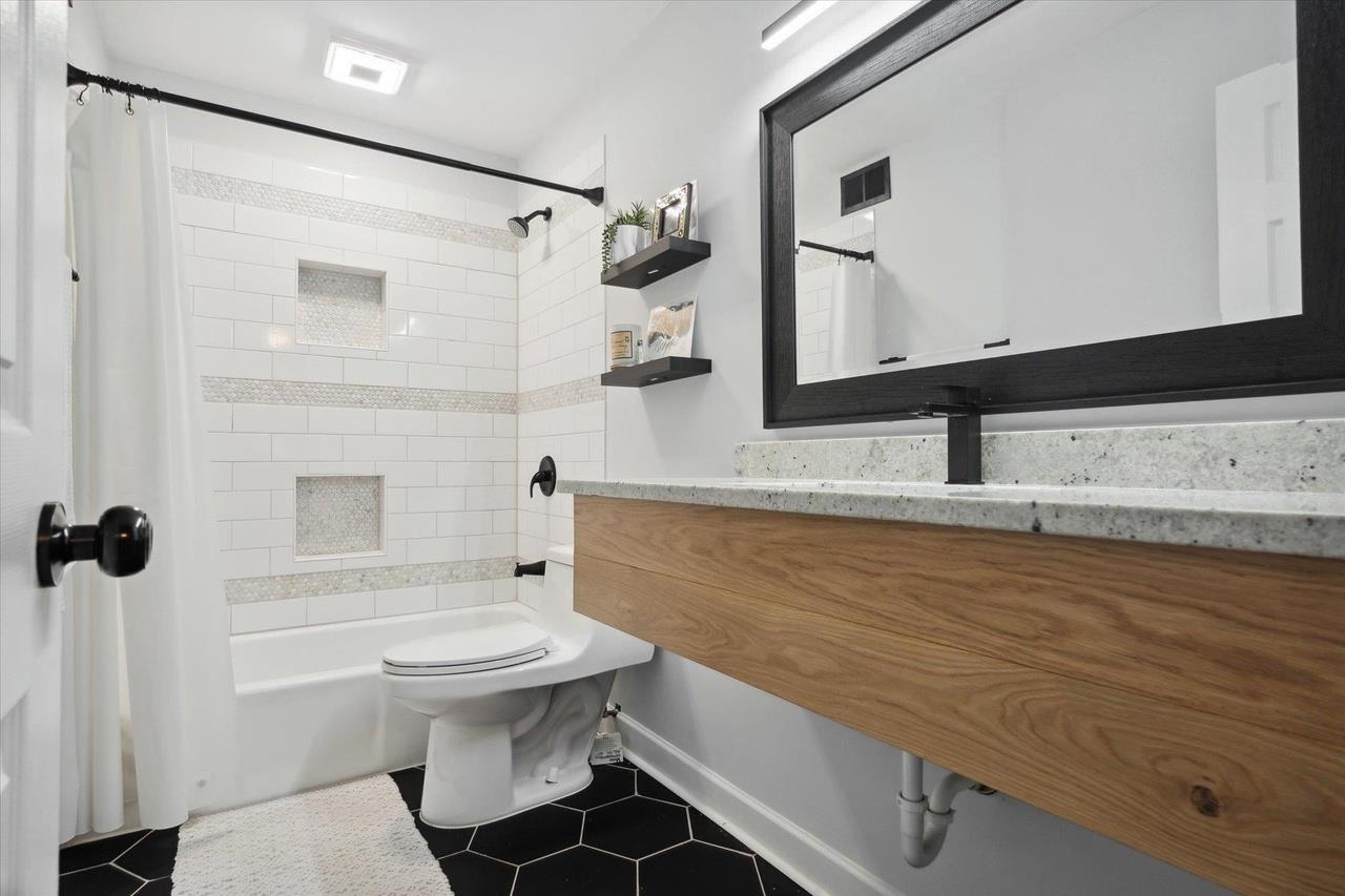 7250 Cedar Road Bartlett, TN 38135 - Photo 21 of 34 a bathroom with a sink a toilet and shower