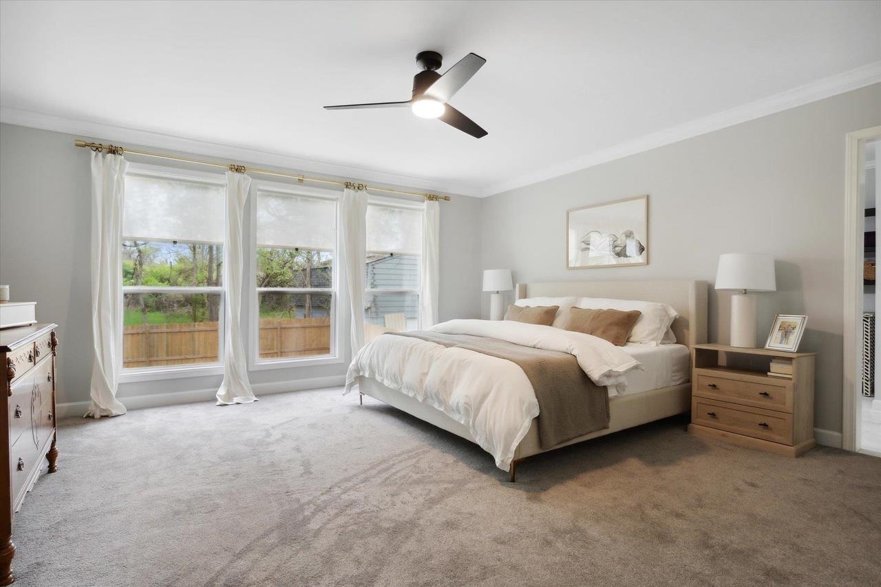 7250 Cedar Road Bartlett, TN 38135 - Photo 24 of 34 a spacious bedroom with a bed and a large window