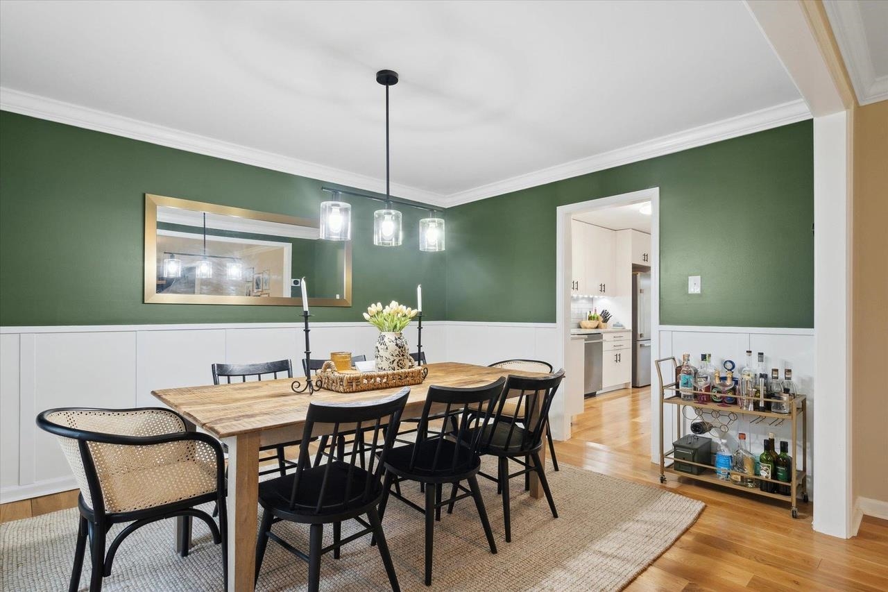 7250 Cedar Road Bartlett, TN 38135 - Photo 7 of 34 a view of a dining room with furniture wooden floor and chandelier
