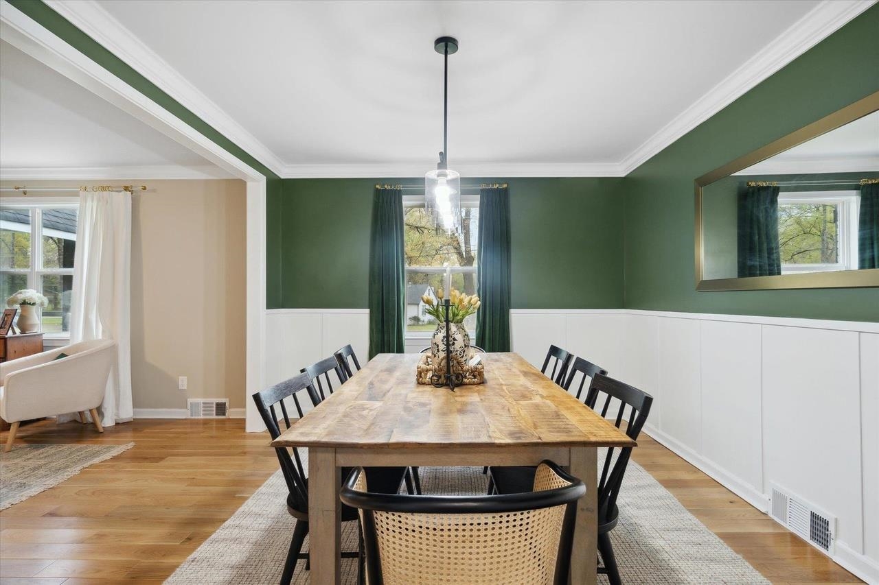 7250 Cedar Road Bartlett, TN 38135 - Photo 8 of 34 a view of a dining room with furniture window and wooden floor
