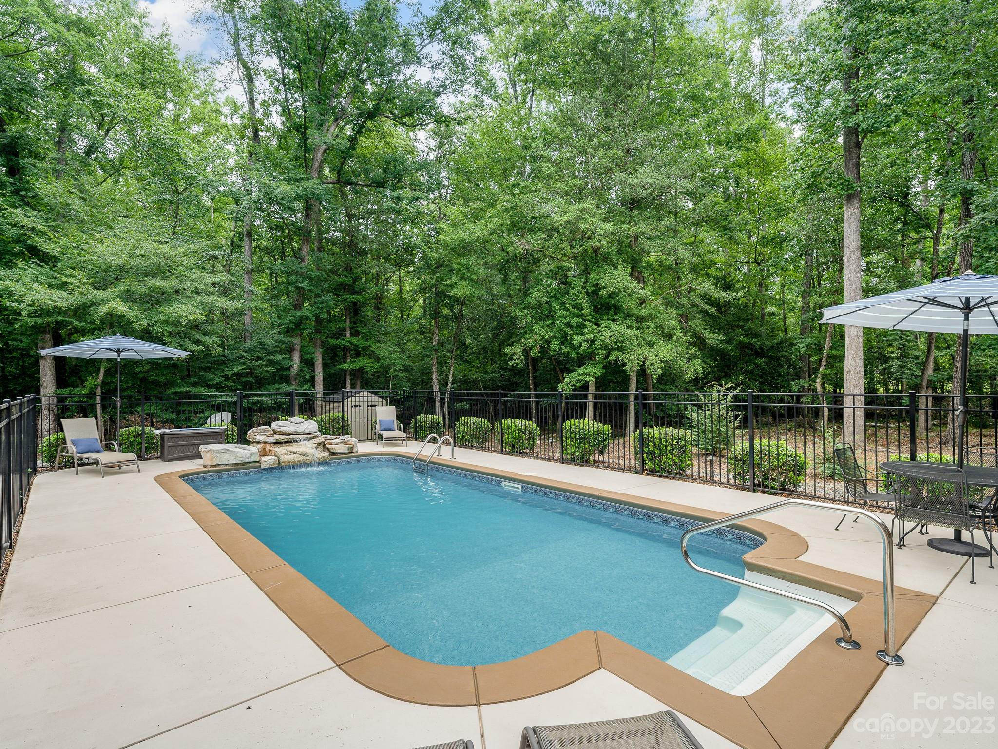528 Manchester Road Mount Gilead, NC 27306 - Photo 24 of 34 a view of a swimming pool with lounge chair