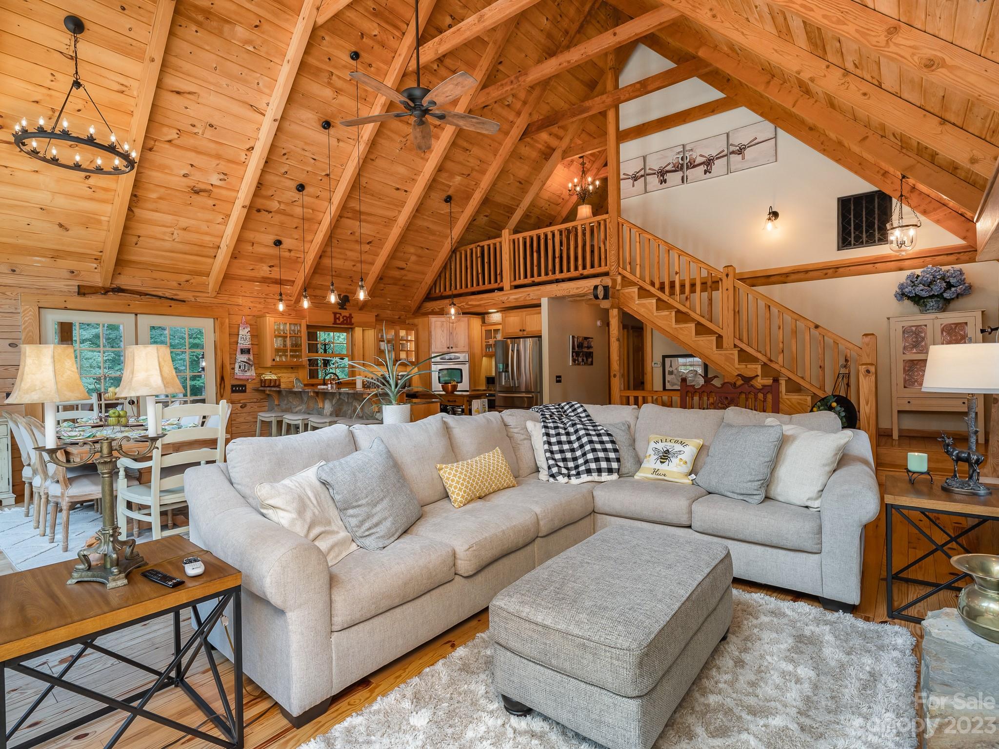 528 Manchester Road Mount Gilead, NC 27306 - Photo 6 of 34 a living room with furniture and a ceiling fan