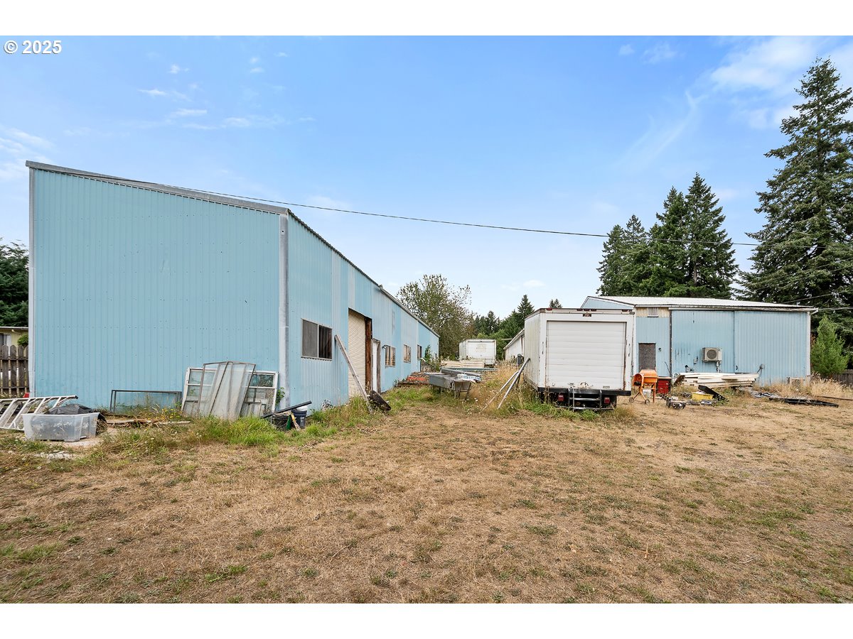 40801-40809 Southeast Trubel Road Sandy, OR 97055 - Photo 23 of 34 a backyard of a house with table and chairs