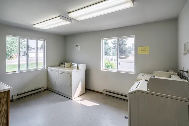 a utility room with a window dryer and washer