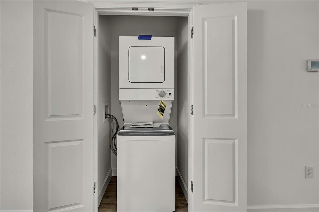 3646 Portillo Road Spring Hill, FL 34608 - Photo 15 of 16 a utility room with washer and dryer
