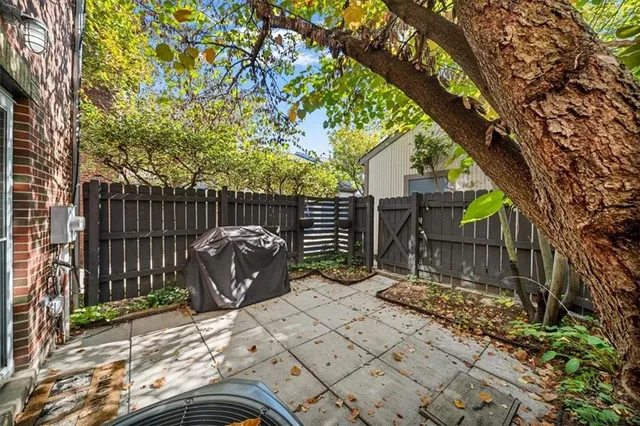 a view of a chairs and table in the wooden deck