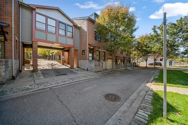 a view of a building with a street
