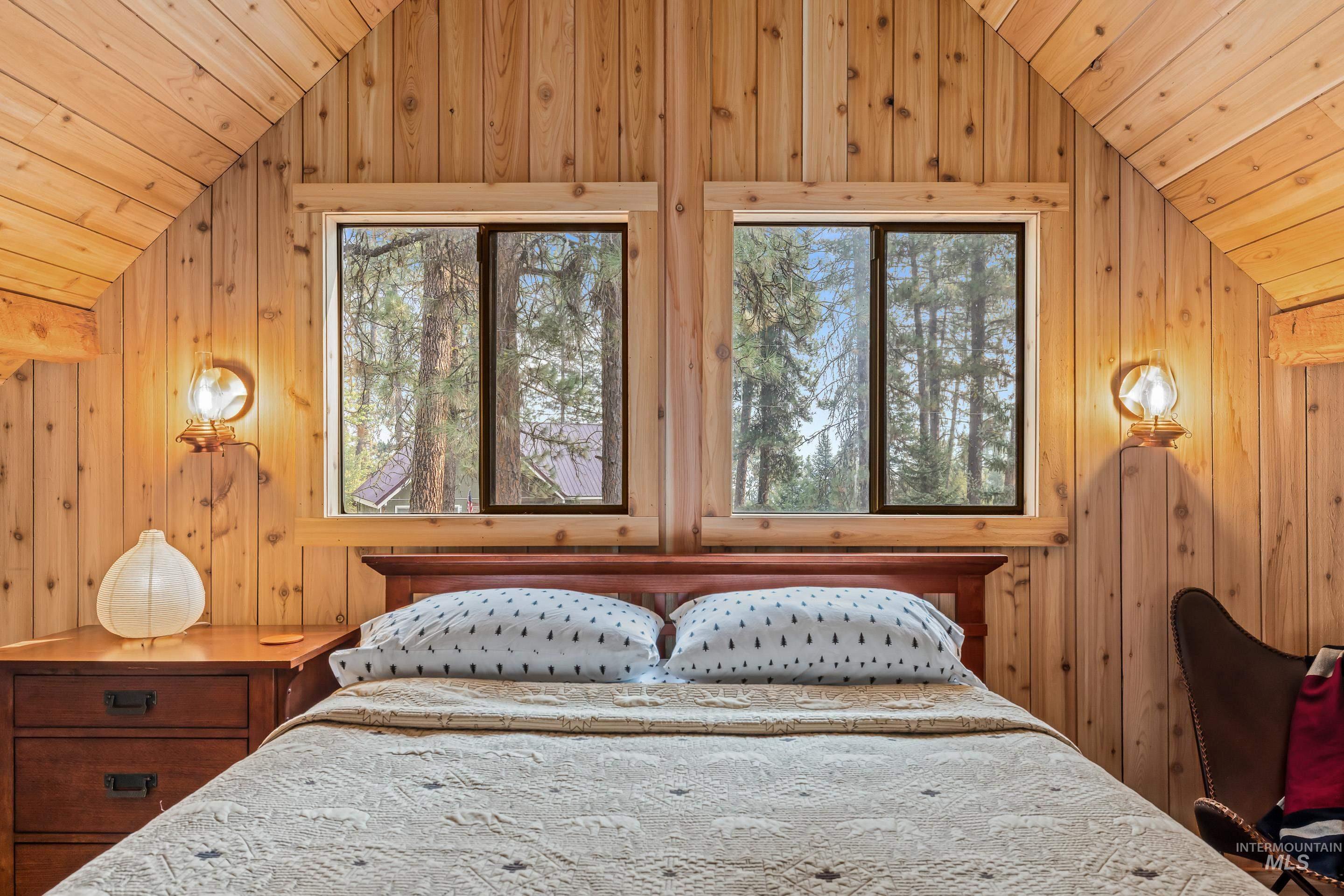 73 Rainbow Ridge Road Garden Valley, ID 83622 - Photo 31 of 49 Wood-paneled walls and ceiling with sloped architectural details