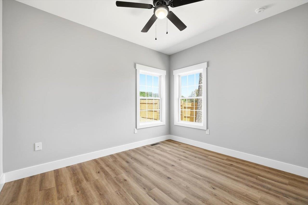 103 Hilltop Terrace Road Staunton, VA 24401 - Photo 27 of 47 a view of empty room with wooden floor and fan