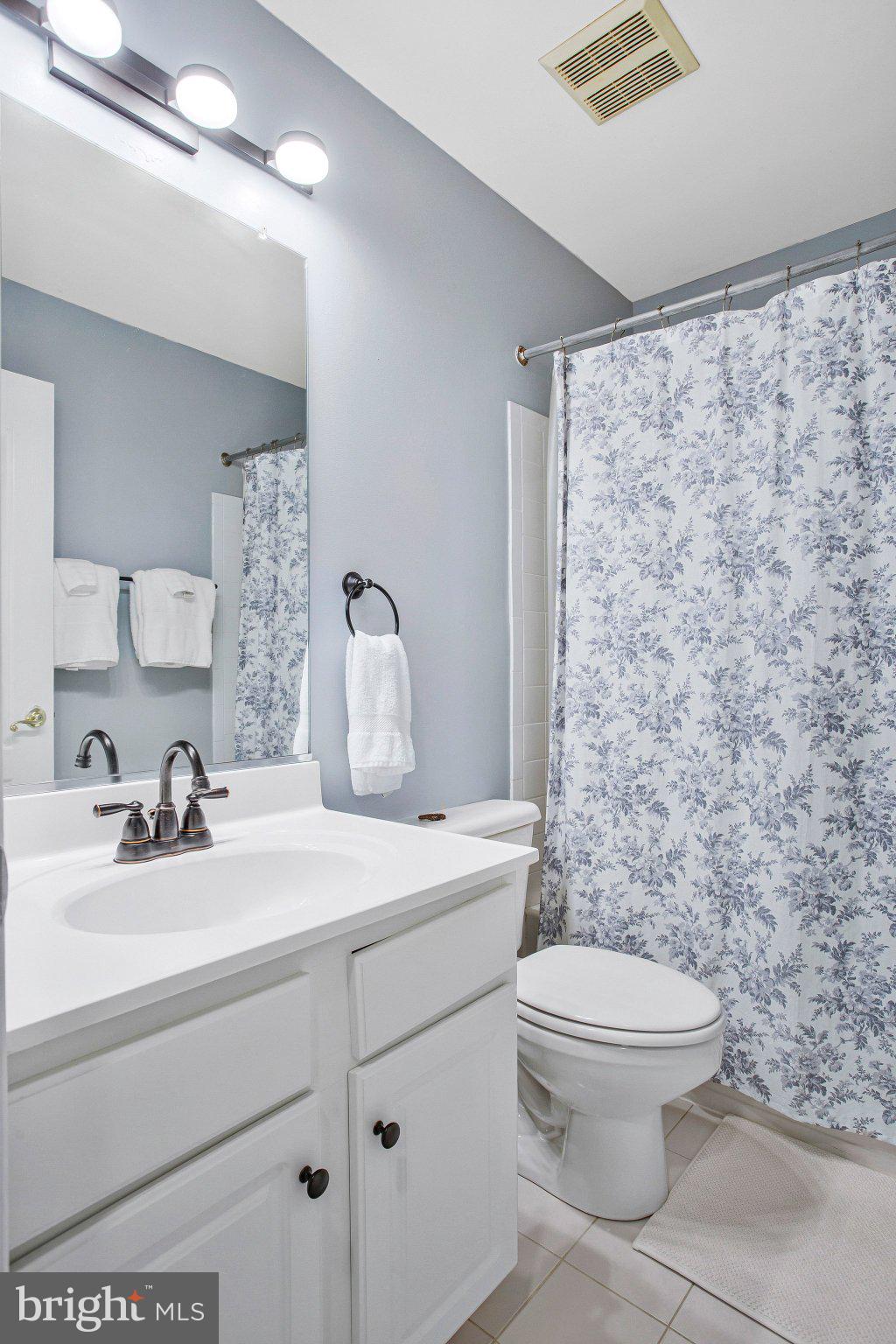 1582 Snug Harbor Road Shady Side, MD 20764 - Photo 42 of 53 Charming bathroom with floral accents.