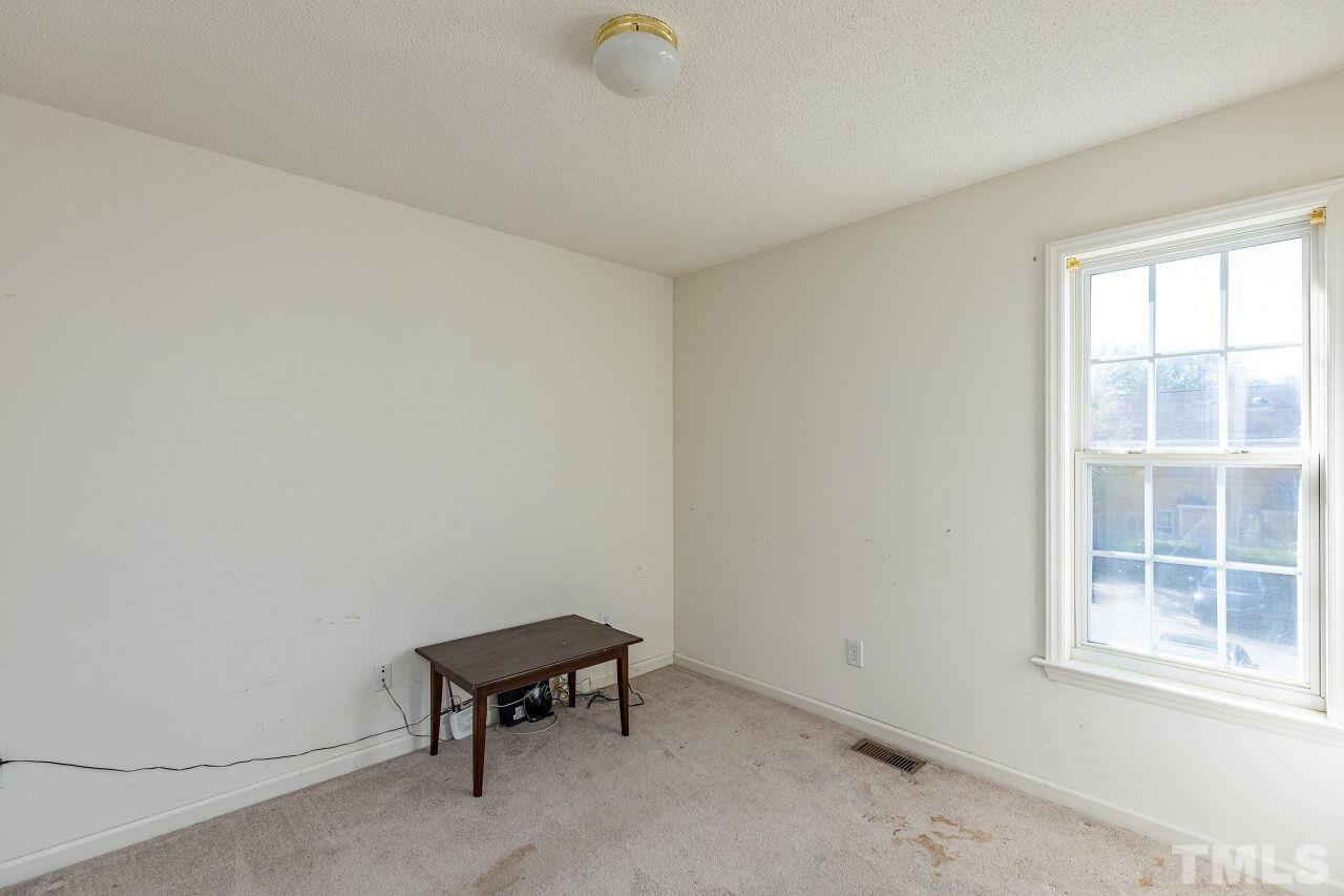 4420 Pottery Lane Raleigh, NC 27616 - Photo 22 of 29 an empty room with a window