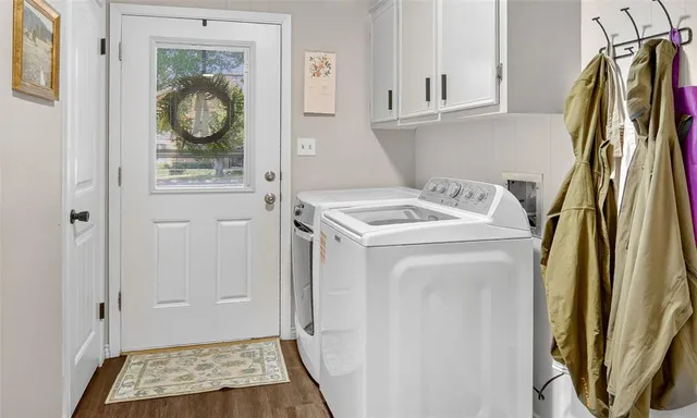 a utility room with dryer and washer