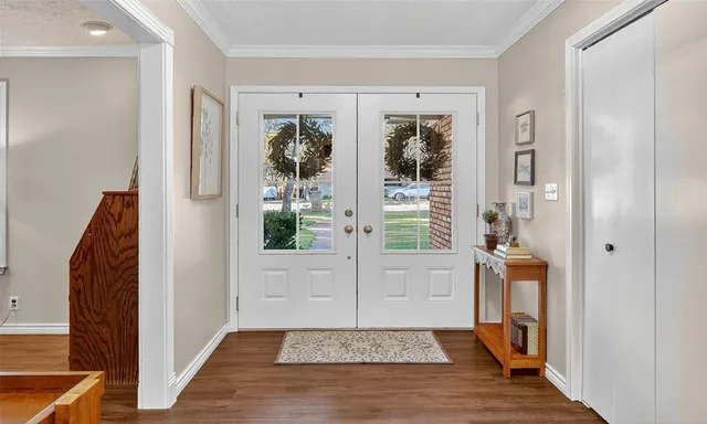 a view of an entryway with a rug