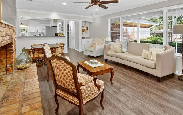 a living room with furniture and a table