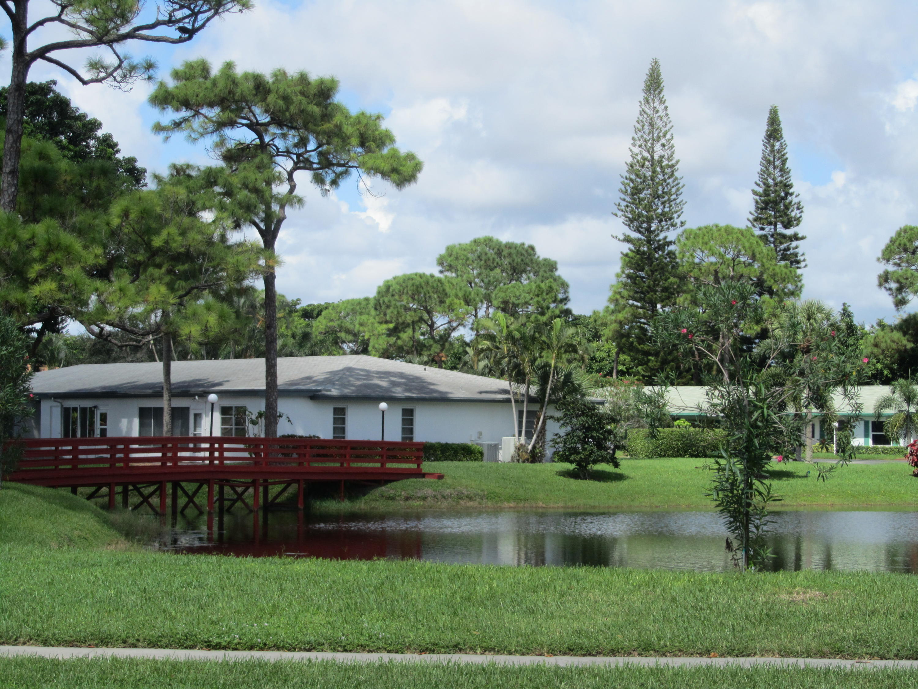 5368 Privet Place, Unit B Delray Beach, FL 33484 - Photo 12 of 15 a view of house with garden space and lake view
