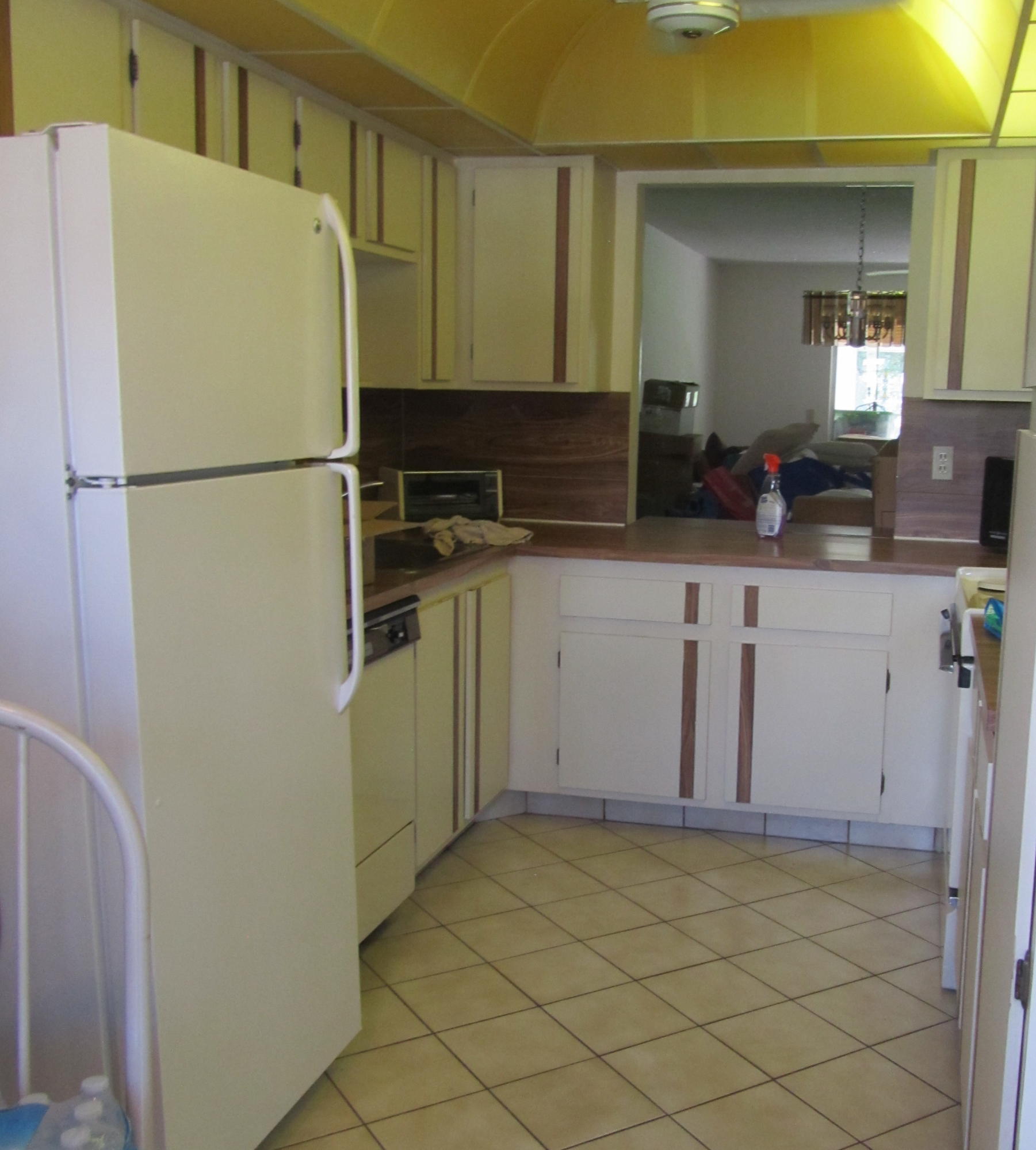 5368 Privet Place, Unit B Delray Beach, FL 33484 - Photo 3 of 15 a kitchen with a refrigerator and a sink