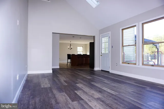 a view of livingroom with furniture and a fireplace