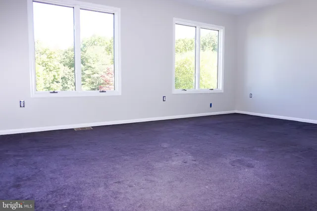 a kitchen with a sink and a window