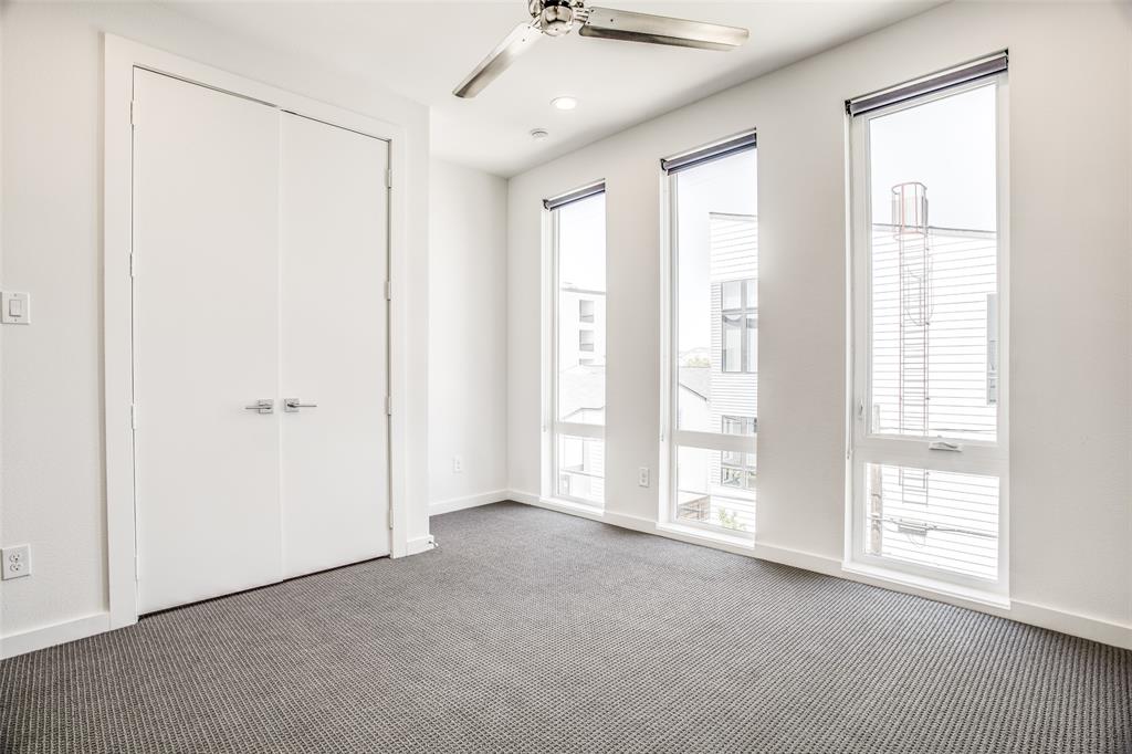 2190 Bennett Avenue, Unit 301 Dallas, TX 75206 - Photo 19 of 21 a view of an empty room with a window