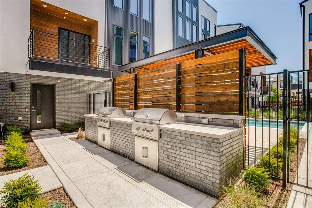 2190 Bennett Avenue, Unit 301 Dallas, TX 75206 - Photo 21 of 21 a view of a patio with a table and chairs